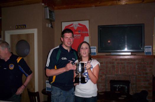 Claire Campbell is presented with Club Person of the Year by Sean Cavanagh